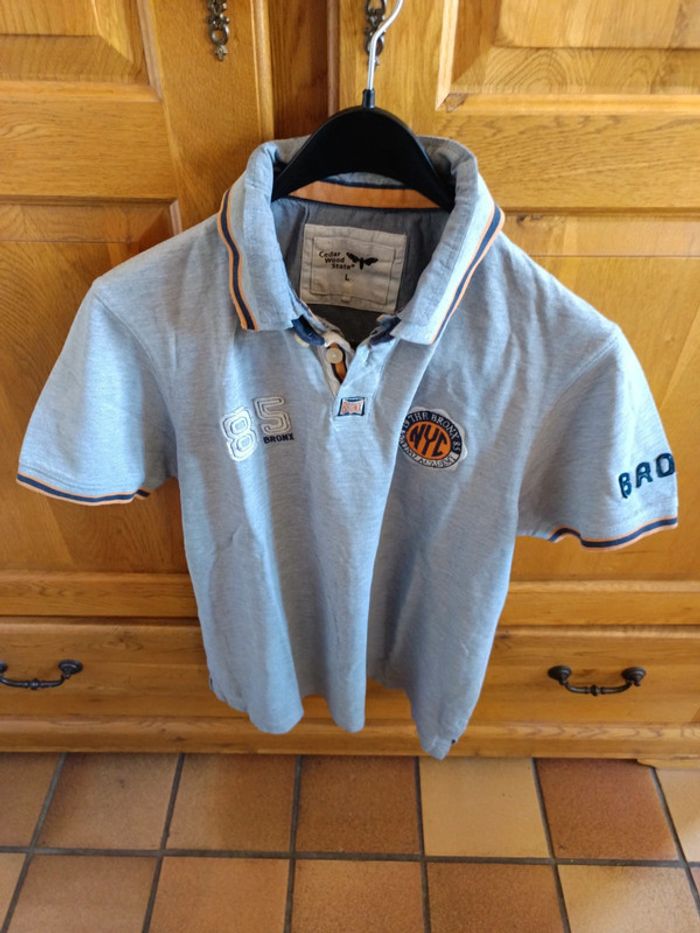 Polo gris