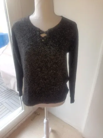 Un pull taille XS