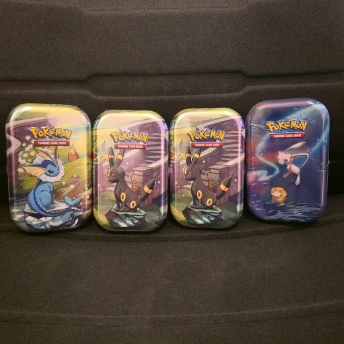 Lot de 3 Mini Tins EV8.5 Aquali / 2 Noctali + 1 Mini Tin Pouvoir de Kanto Mew (EB10/EB11)