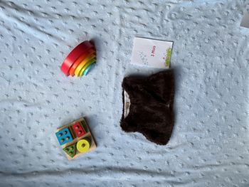 gilet sans manches en fourrure marron intérieur blanc et rose 3 mois boite à malices