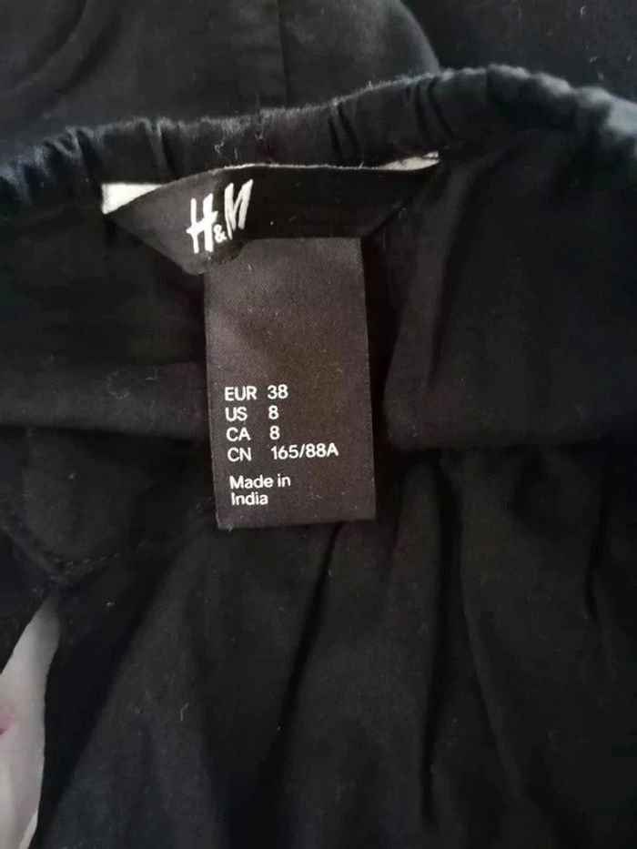 Robe noir et une robe léopard h&m taille 38 - photo numéro 6