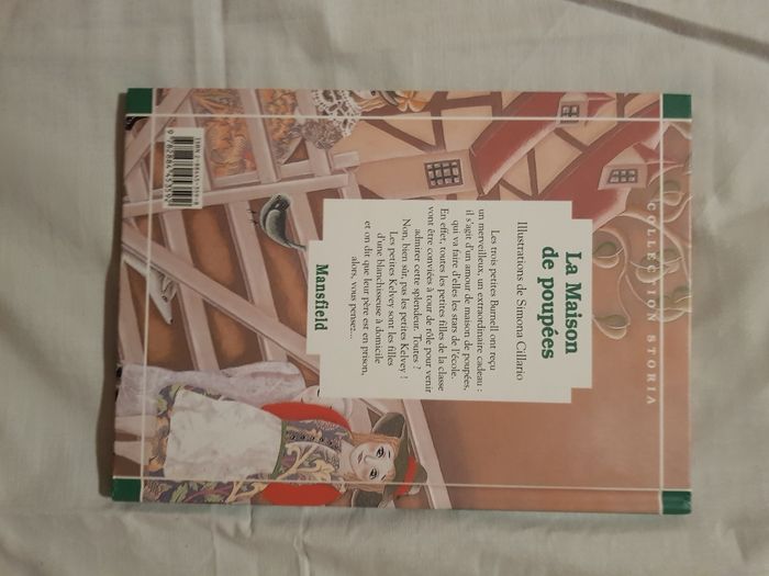 Livre la maison des poupées - photo numéro 2