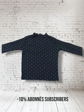 Polo noir à manche longue à pois blanc Kiabi