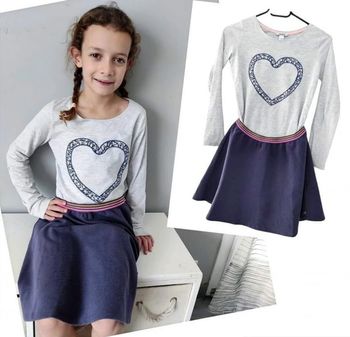 10 ans ensemble Teeshirt Okaïdi et Jupe sergent major