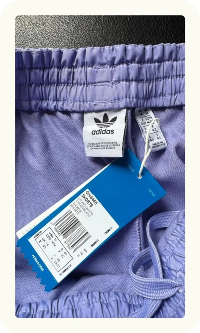 Short court sport course Adidas Fakten Taille XL 42 Neuf - photo numéro 3