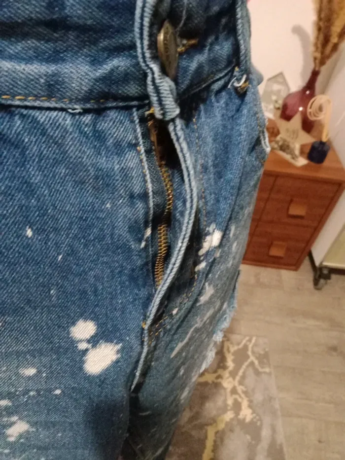 Jeans bleu troué - photo numéro 4