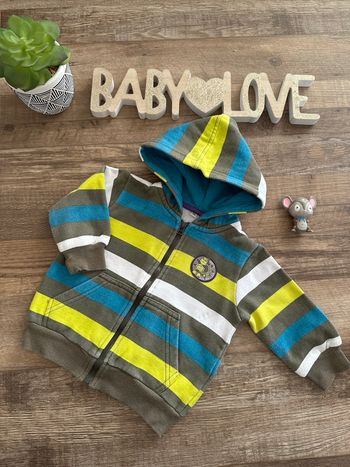 - Veste      - 12 mois - bon état 