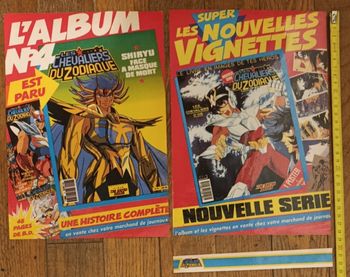 Lot 2 anciennes publicités plastifiées Les chevaliers du zodiaque 1990 vintage