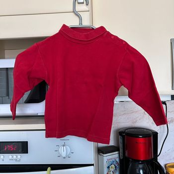 Pull col roulé rouge