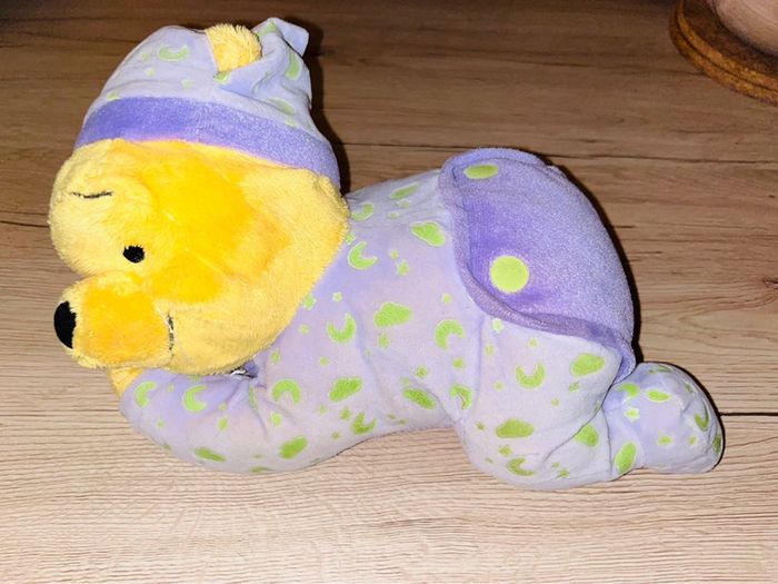 Peluche Winnie phosphorescent 30cm