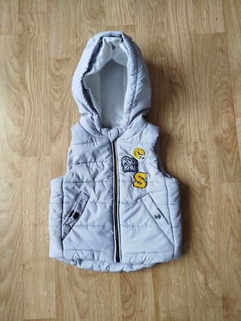 Manteau sans manche taille 3 mois 