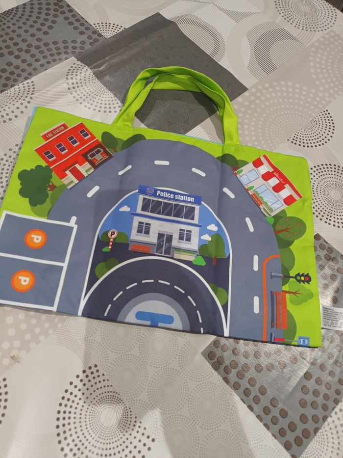 Petit sac de rangement et tapis jeu