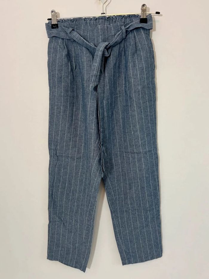Pantalon bleu rayé