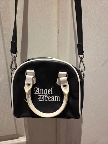 Petit sac blanc et noir avec double ance