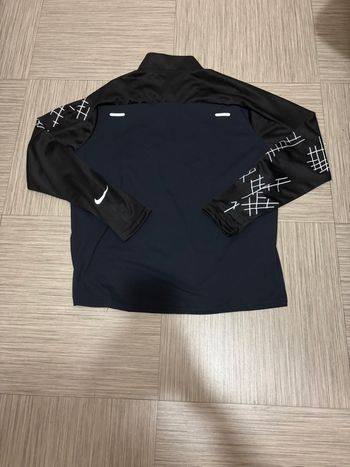 Haut Nike running division araignée M