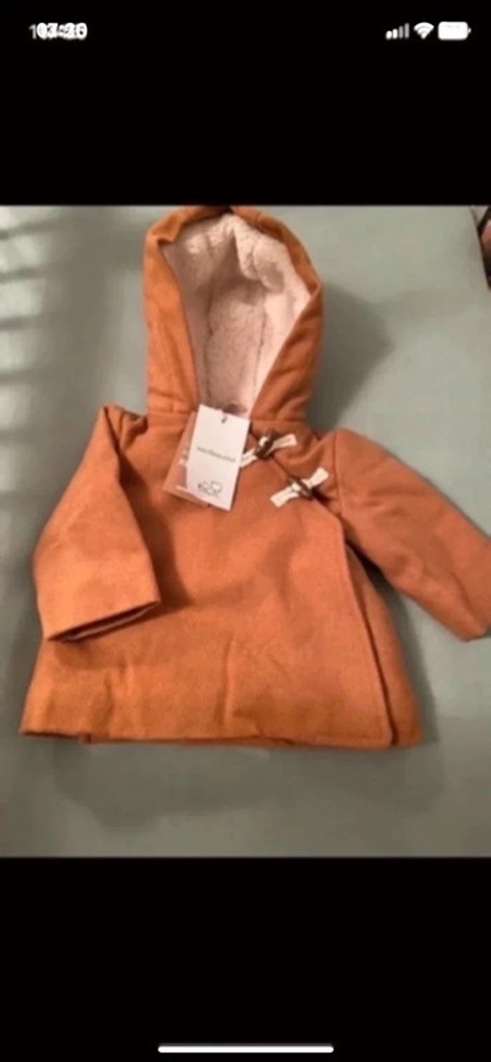 Manteau chaud neuf