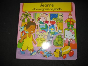 LIVRE CARTONNÉ "JEANNE ET LE MAGASIN DE JOUETS" - NEUF - n°08