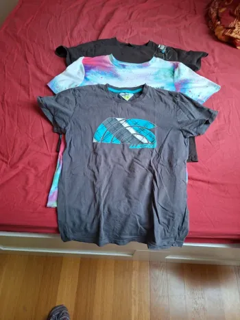 Lot de  tee-shirts shirts anvhes courtes 14.ans
