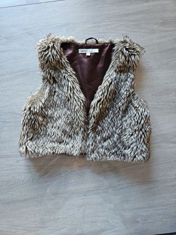 Gilet fourrure T 12 ans fille
