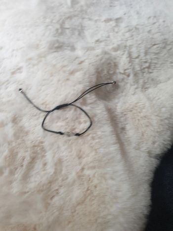 Neuf bracelet cœur noir et argent