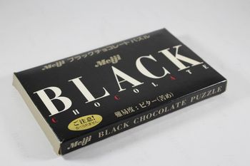 Meiji Black Chocolate Puzzle 100% Complet