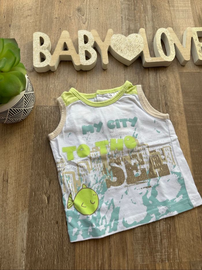 - Tee shirt - 3 mois - Très bon état
