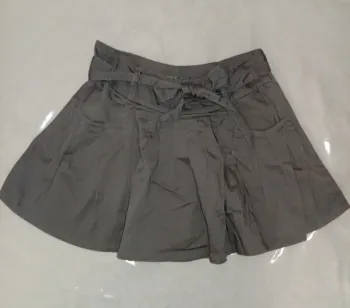 Mini jupe évasée et plissée