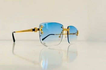 Lunette de soleil mixte percée dorée verres bleus dégradés UV protection taille moyenne