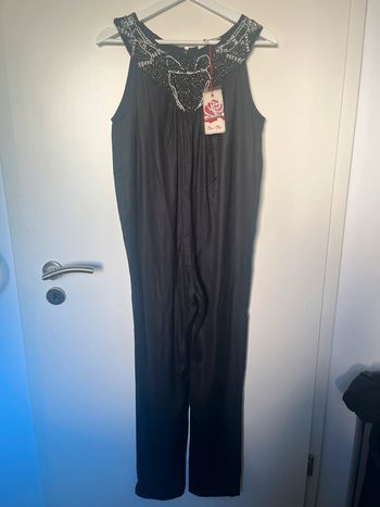 Combinaison avec strass bel air S neuve