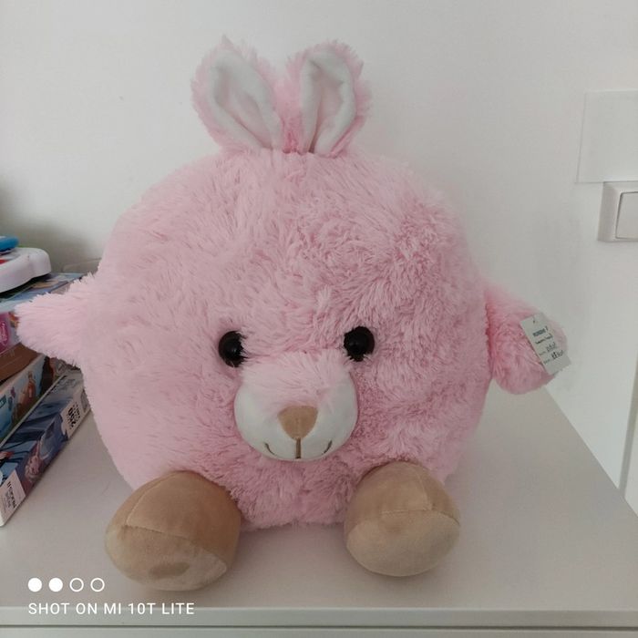 Grosse peluche lapin rose