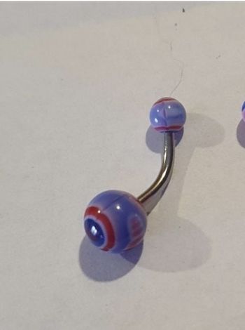 Piercing Nombril neuf rouge et bleu