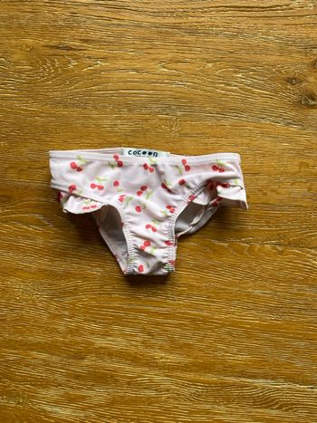 Maillot de bain rose avec imprimé cerises taille 74