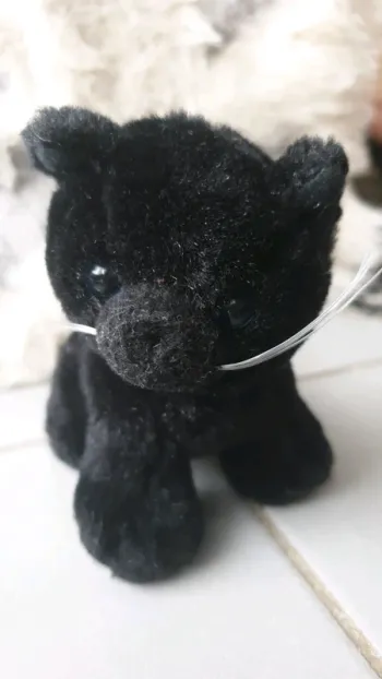 Peluche panthère noire