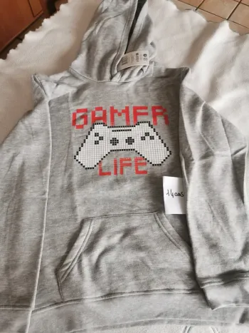 Pull neuf 14 ans
