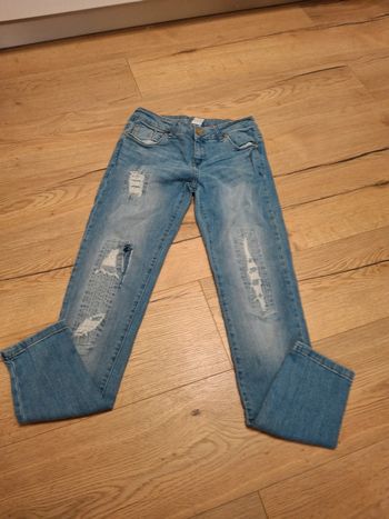 Jean troué bleu clair femme / fille taille 16 ans ( 176 )