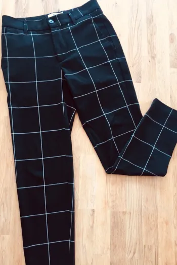 Pantalon à pince noir et blanc