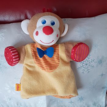 Haba: Doudou-marionnette "Petit Singe aux tambourins "