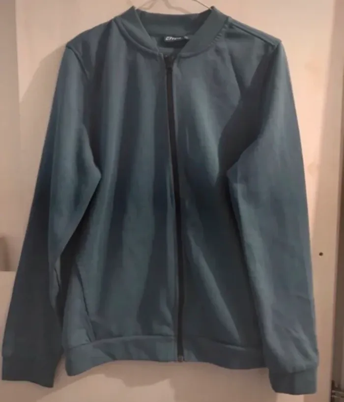 Veste crivit demie saison manches longues capuche bleu taille L