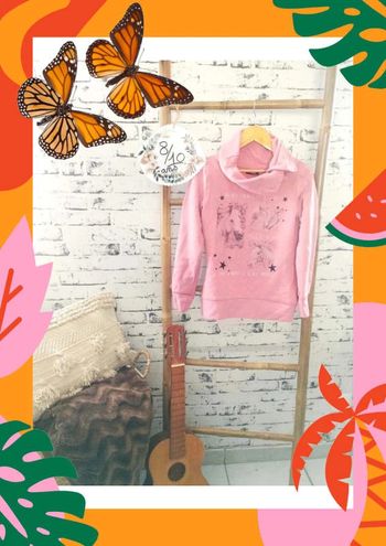 Pull rose 8/10ans cheval