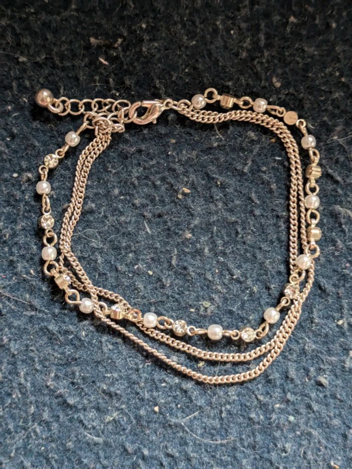 Bracelet fantaisie a perles blanches - photo numéro 2