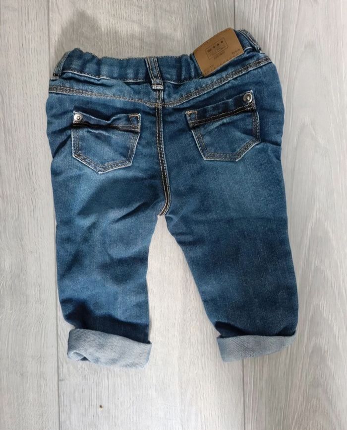 Jean bébé 6 mois Tape à l'Œil denim bleu foncé à revers  Tres Bonne Etat - photo numéro 2