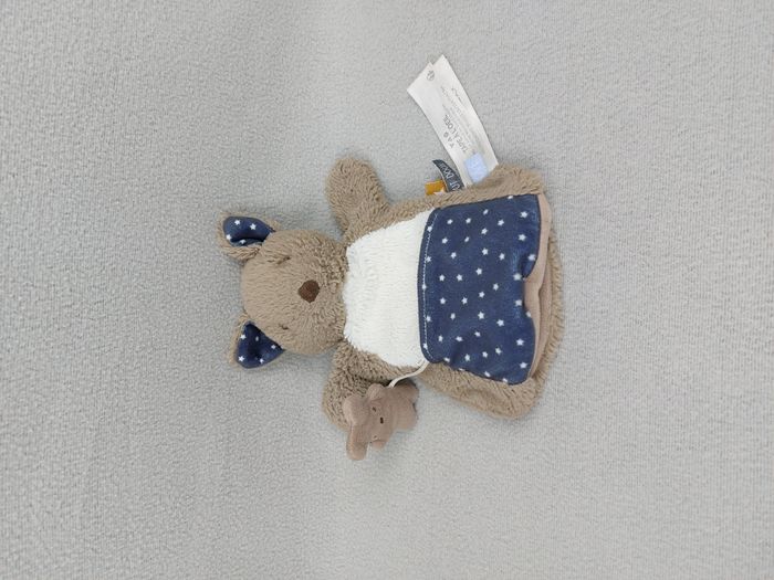 Doudou peluche ours marionnette TAO Tape à l’oeil marron blanc étoiles bleues