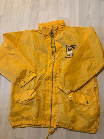 Imperméable camps 12 ans jaune très bon état