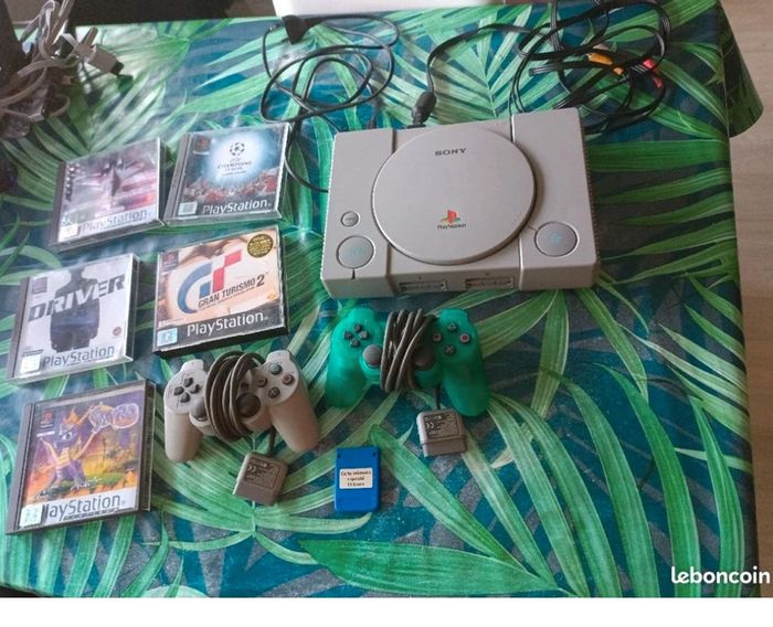 PlayStation 1 avec jeux et Manettes