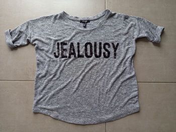 Très beau tee shirt en maille en très bon état