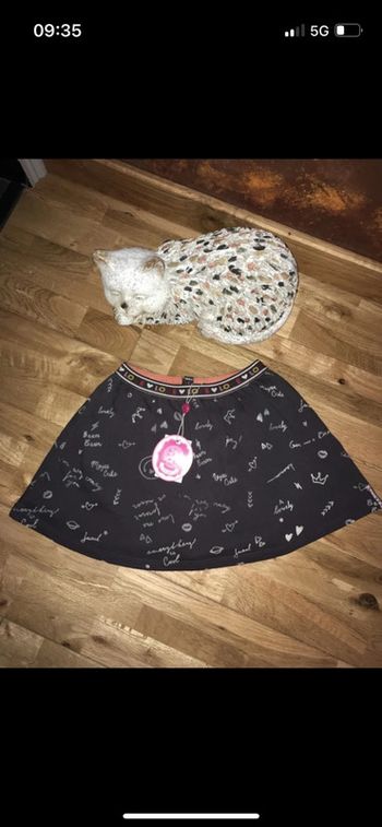 Jupe grise motifs jubelo neuve avec étiquette 8 ans/128 cm