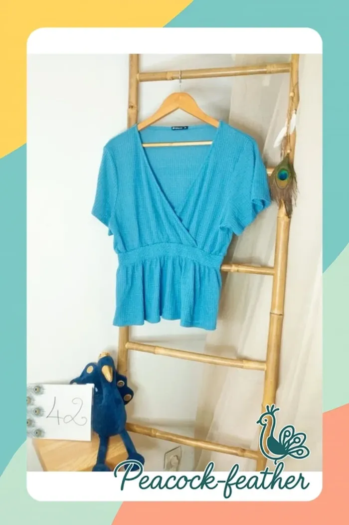 Haut péplum bleue 42 follow me