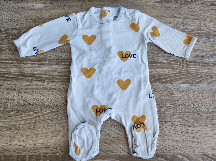 Pyjama grenouillère cœurs jaunes