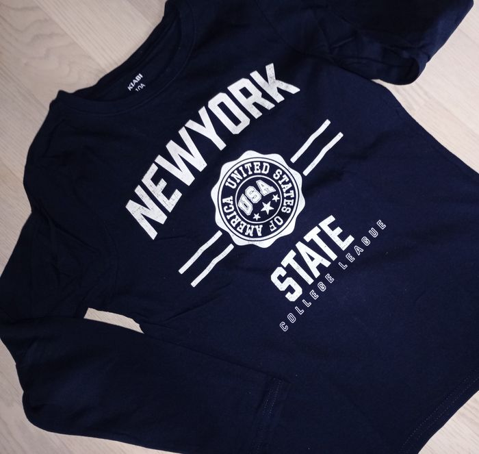 Tee-shirt bleu marine motif New York Kiabi 
T. 10 ans 
NEU - photo numéro 2
