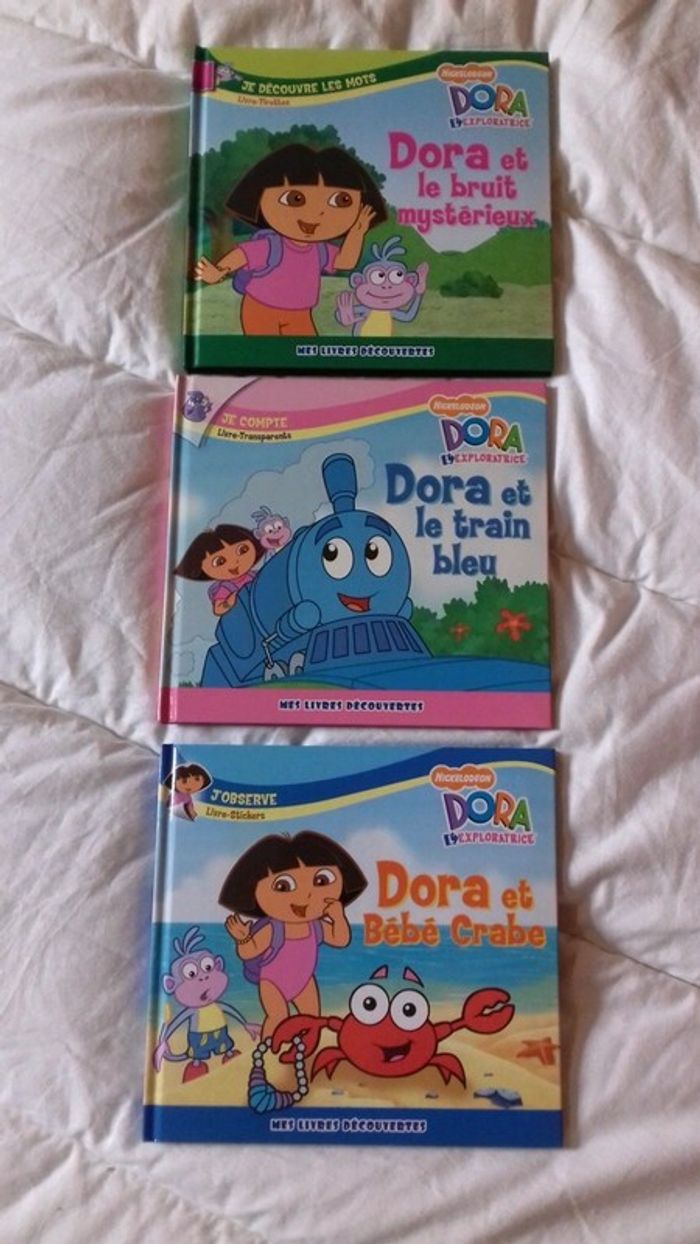 3 livres Dora